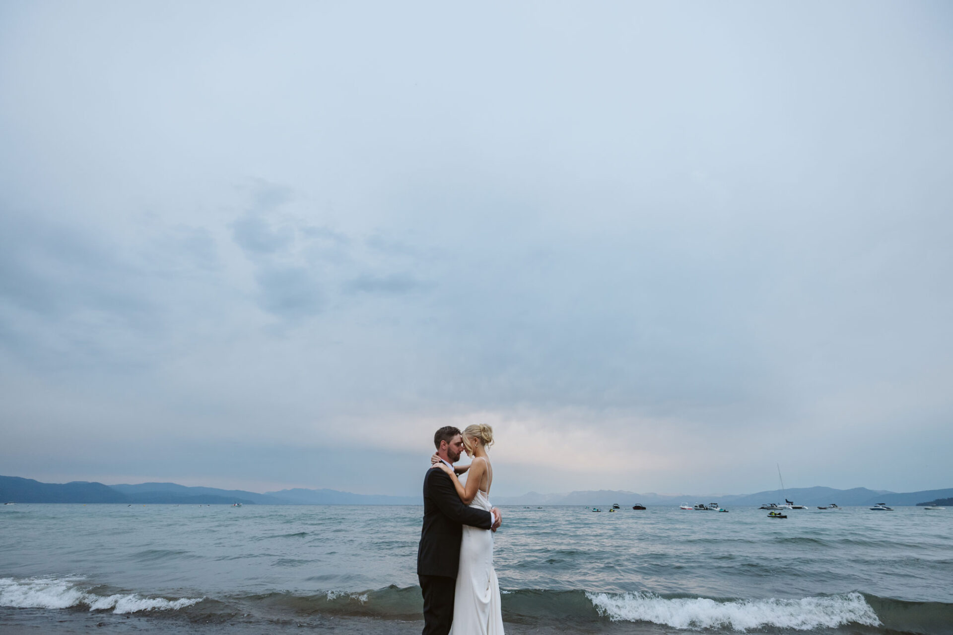 Bride and groom sharing a quiet moment by Lake Tahoe