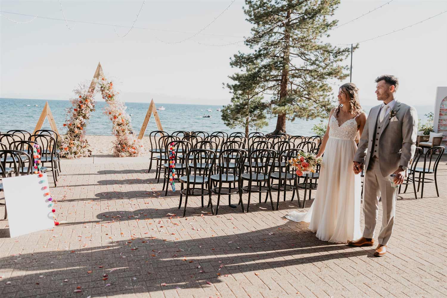 Bride and groom during their first look before the ceremony, standing together and gazing into the distance